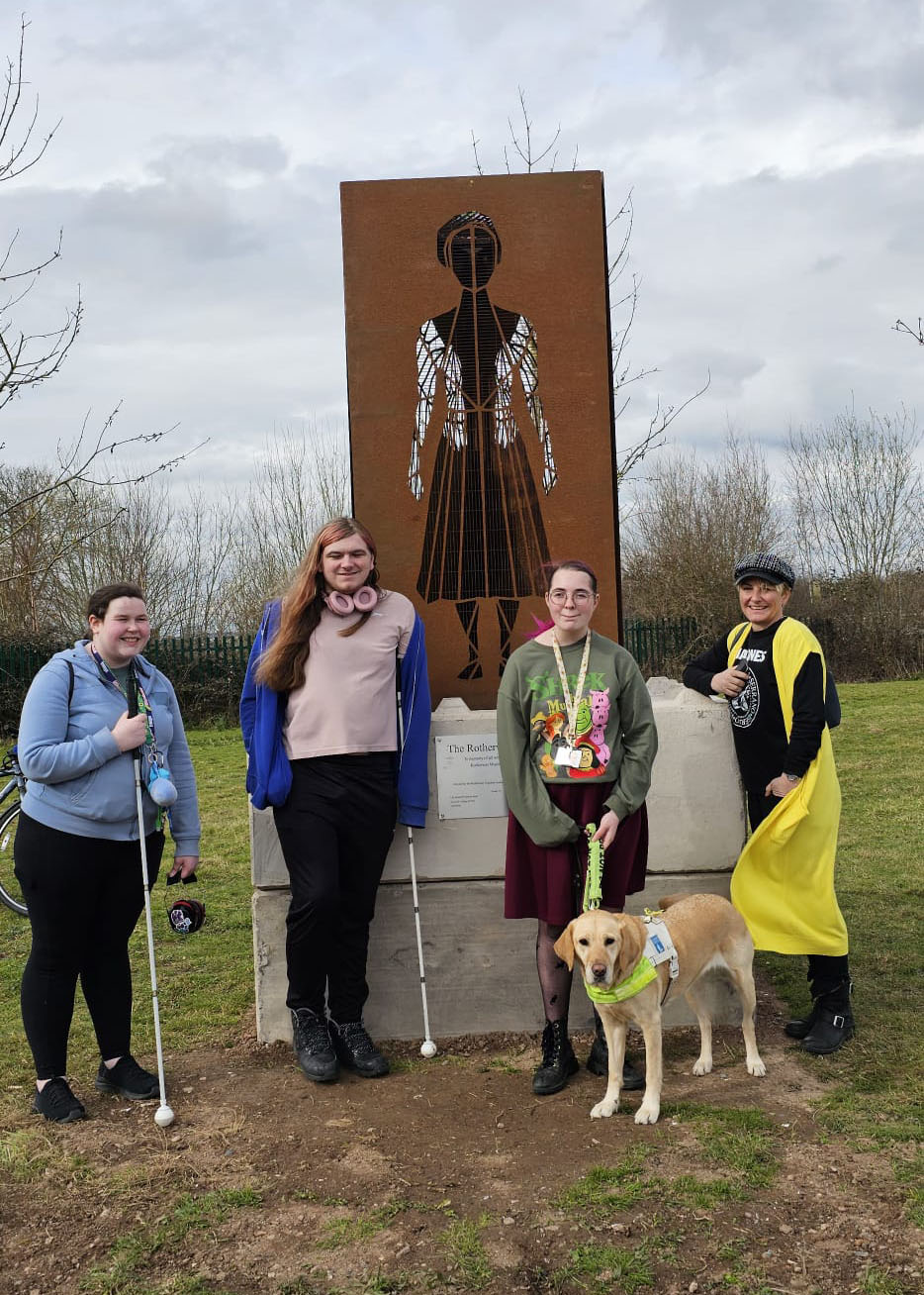 The group from RNC stand in front of the newly unveiled Rotherwas Angel