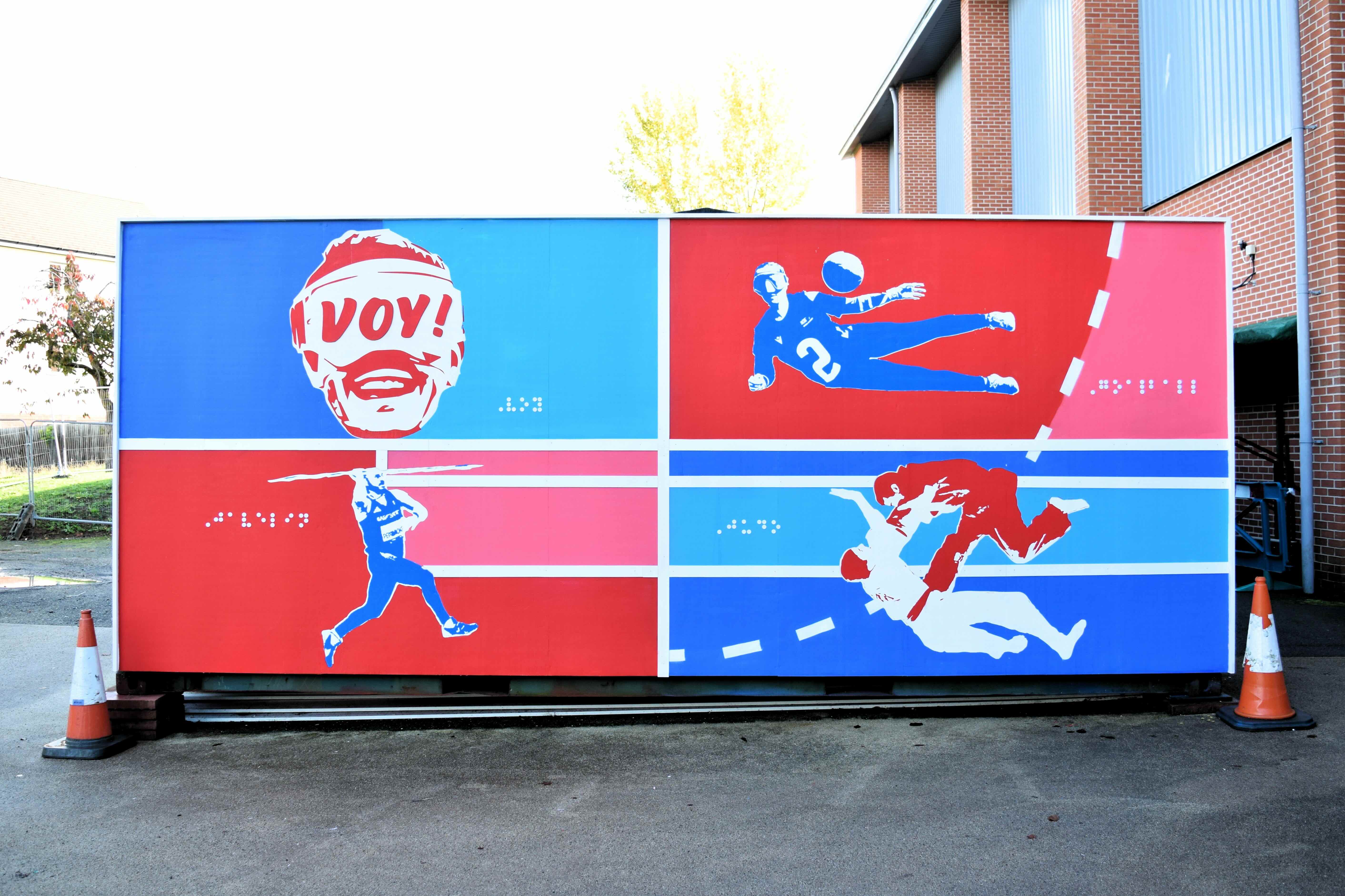 The complete art work in red, white and blue which shows the head of a blind footballer wearing shades, a goalball player defending goal, an athlete throwing a javelin and two judo players in mid throw