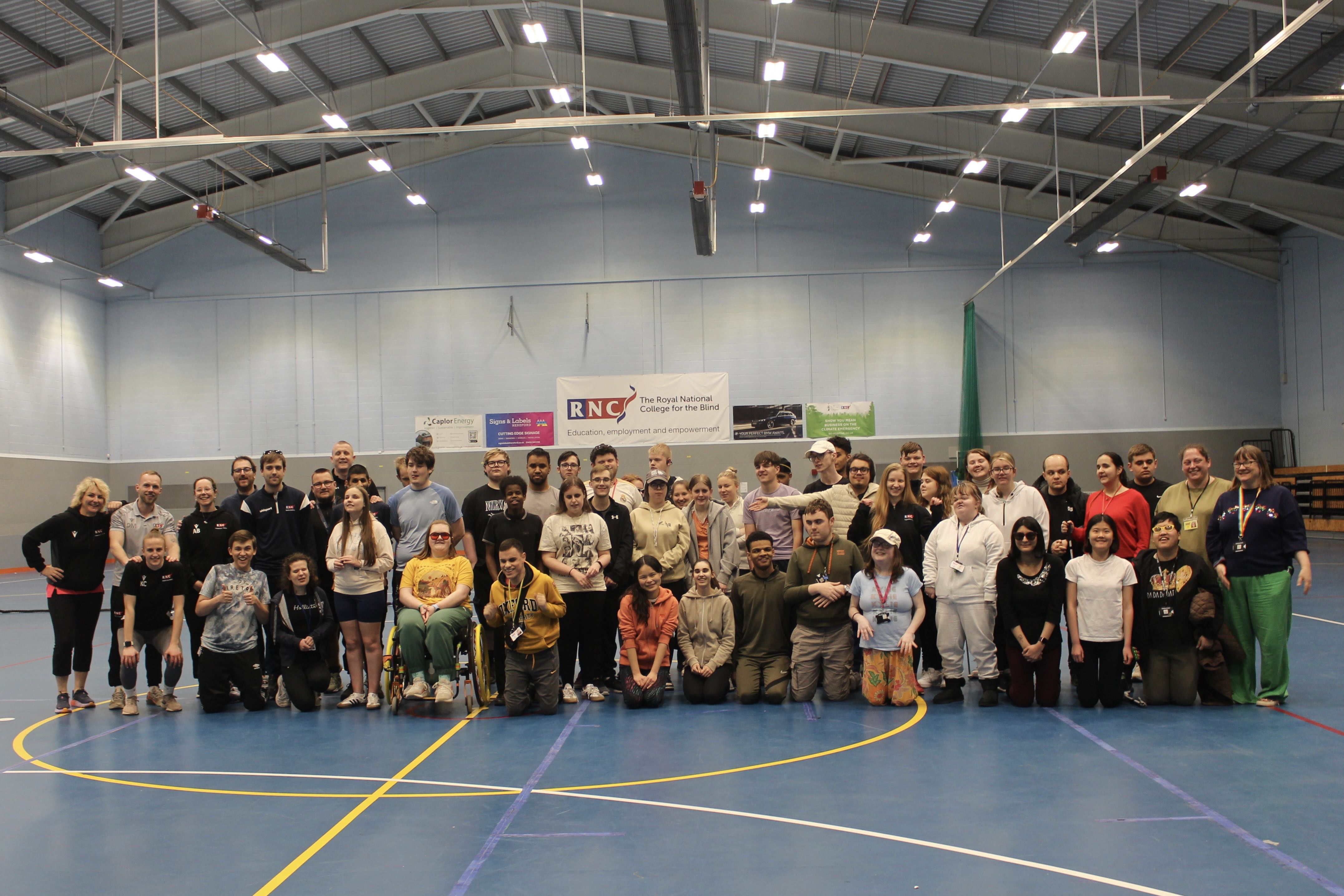 a group photo of all the staff and students that took part in the classic sports day