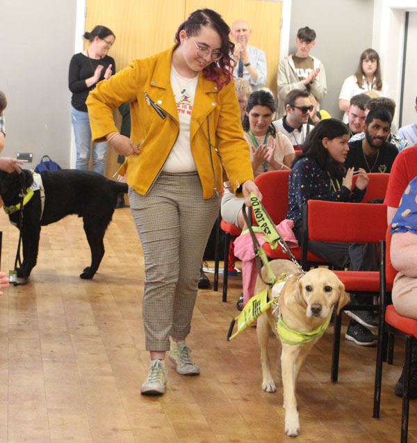 A student with a guide dog