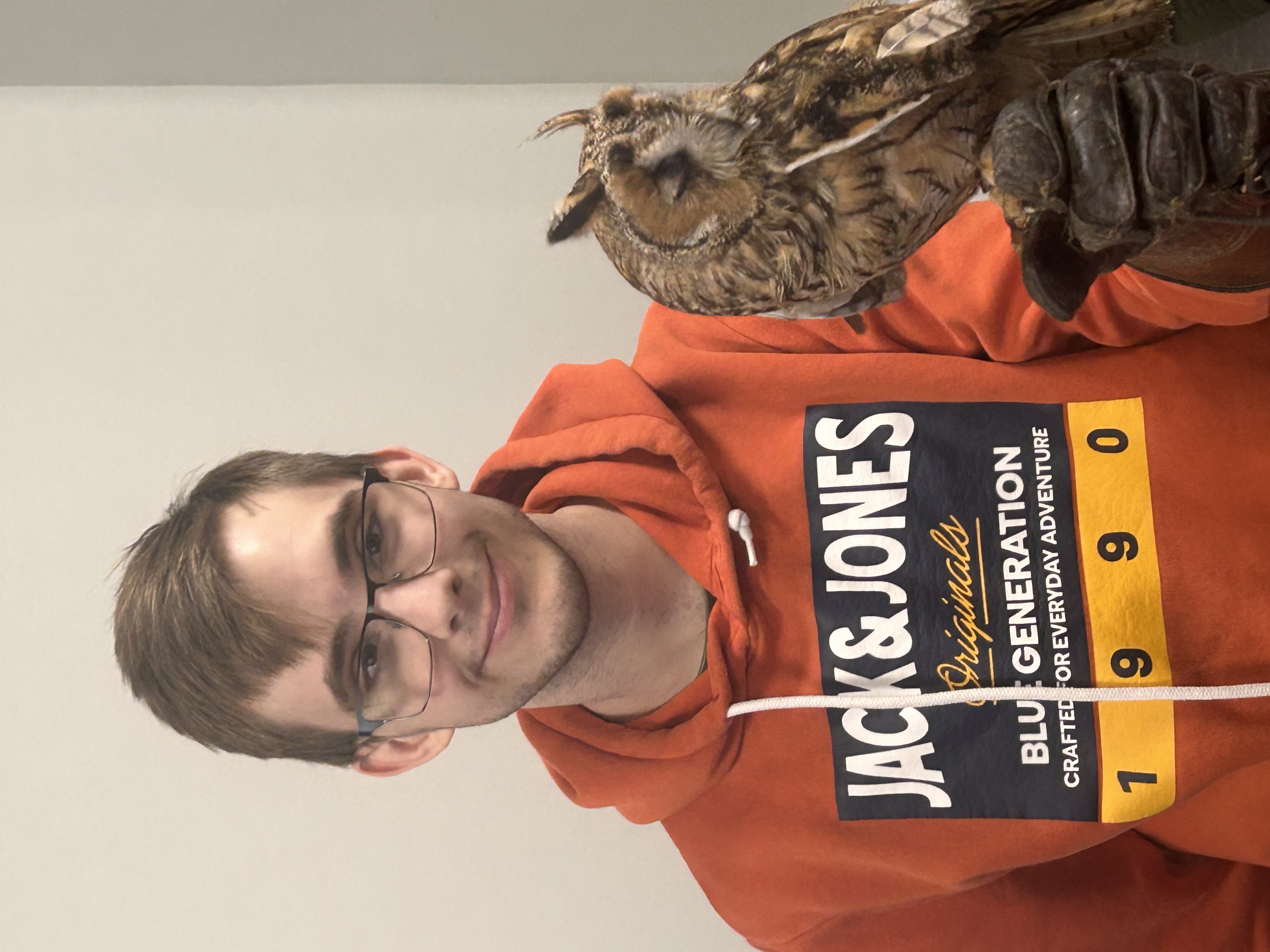 and holding Elsa the Long Eared Owl