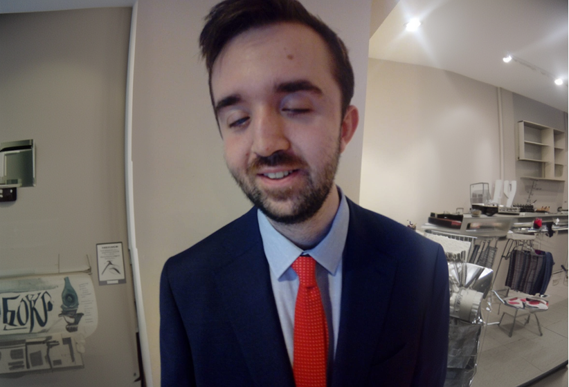 Picture of Rob dressed in a suit and tie.