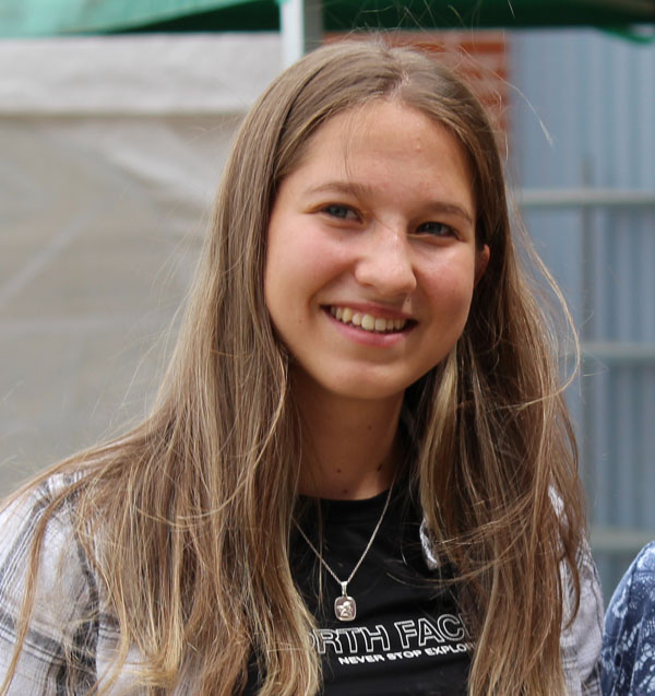 A headshot of Lucja smiling