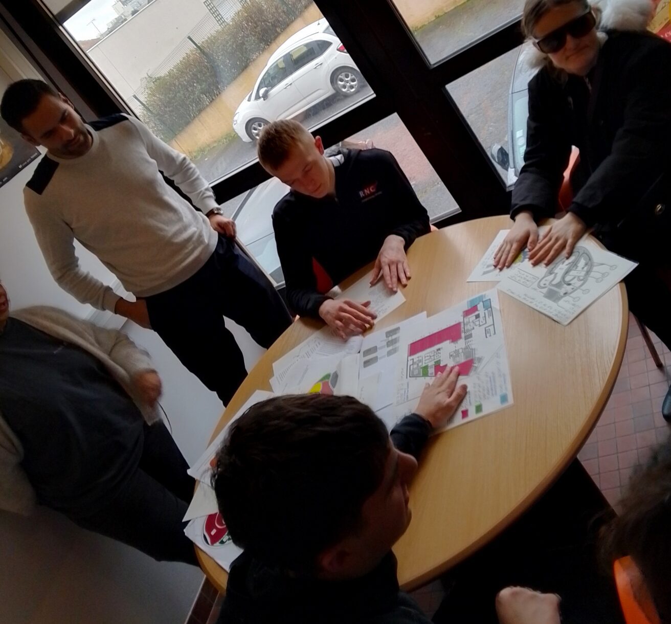 Students exploring tactile diagrams of the anatomy