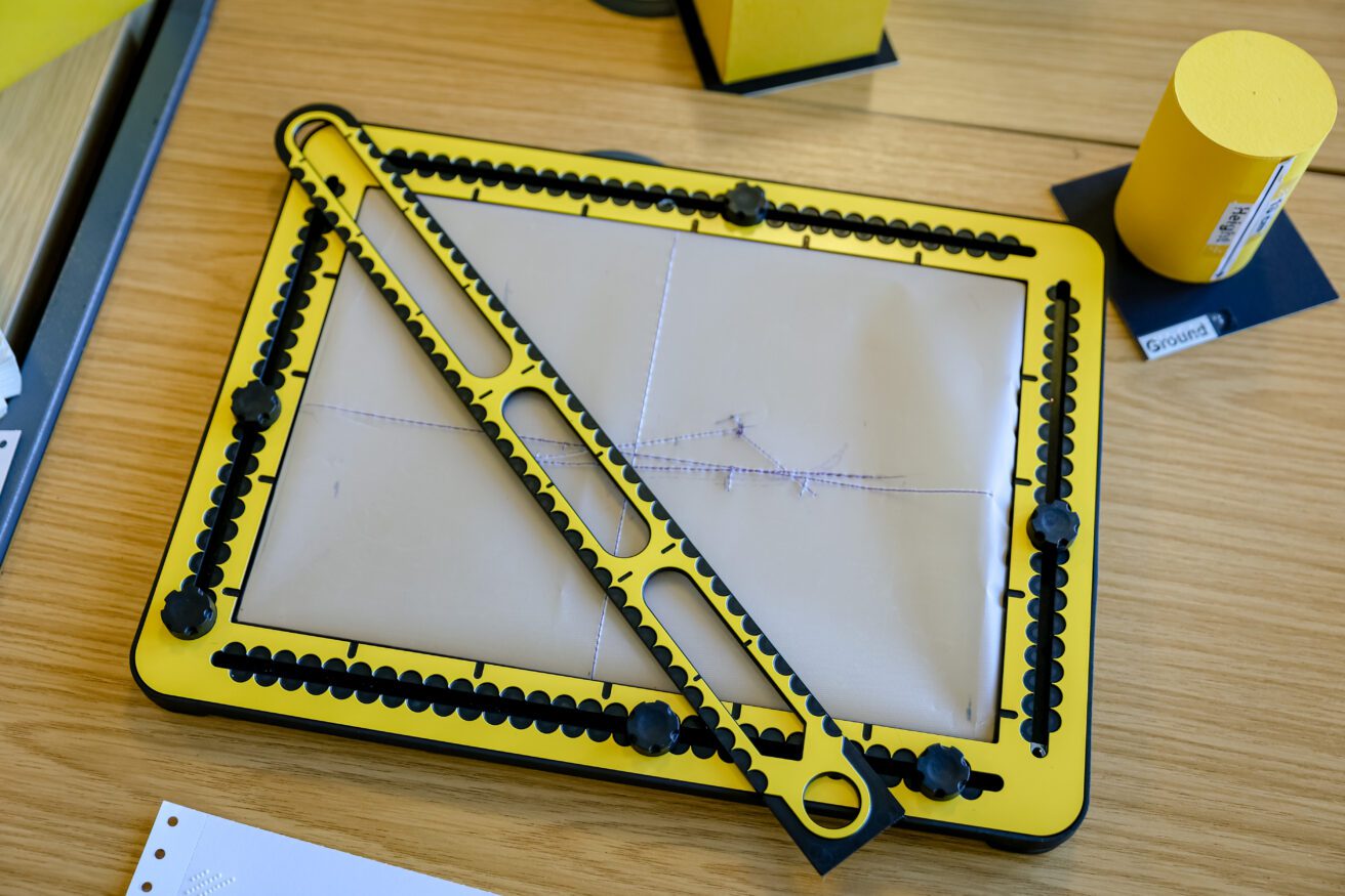 a tacti pad sitting on a desk